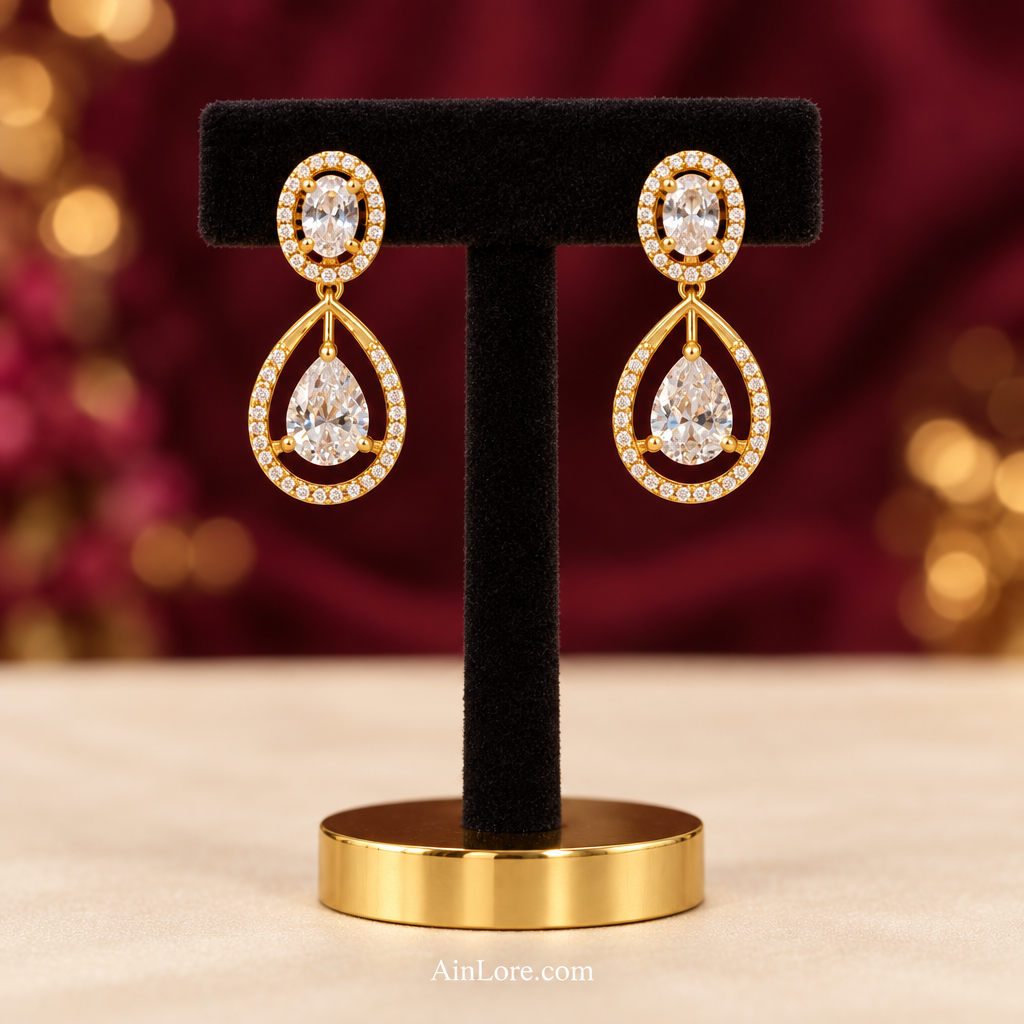 Earring pair on a black velvet T-stand