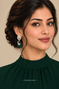 Ananya wearing green-drop earrings