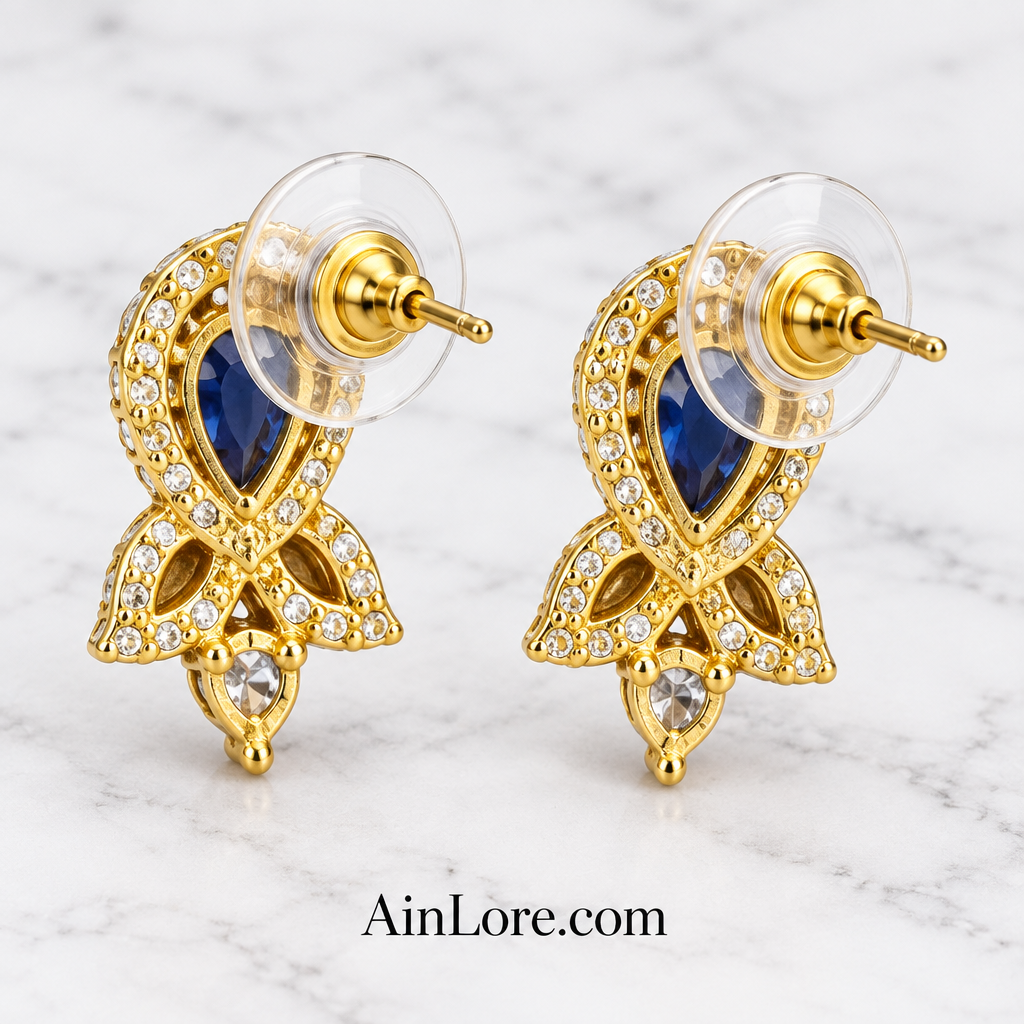 Blue stud earrings showing the push-disc clasp