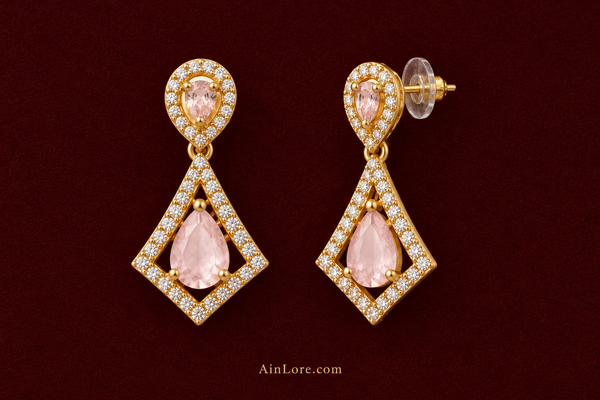 Blush pink kite-drop earrings with push-on clasp visible