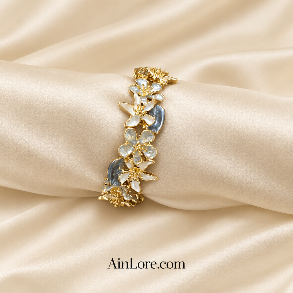 Bracelet flatlay on a cream satin roll