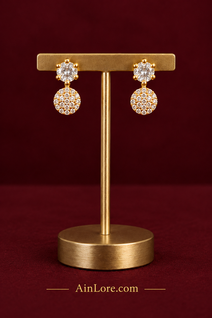 Clear-stone earrings on stand