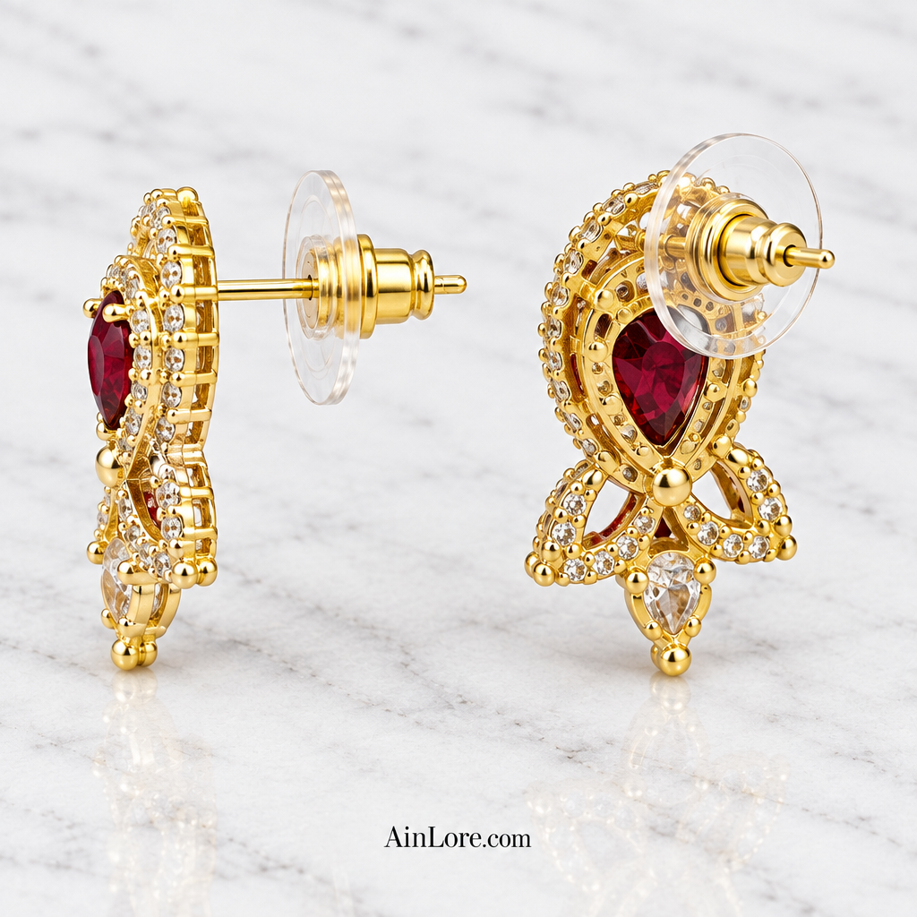 Deep red studs with post visible through the clasp