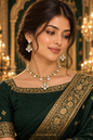 Meena – All-White Diamond Set in Dark Green Saree