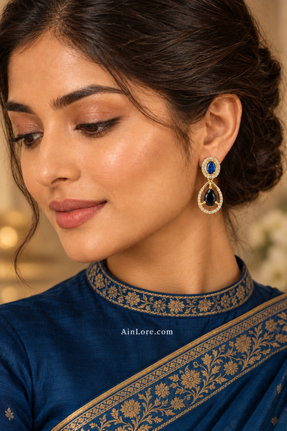 Meena wearing the blue-stone teardrop earring