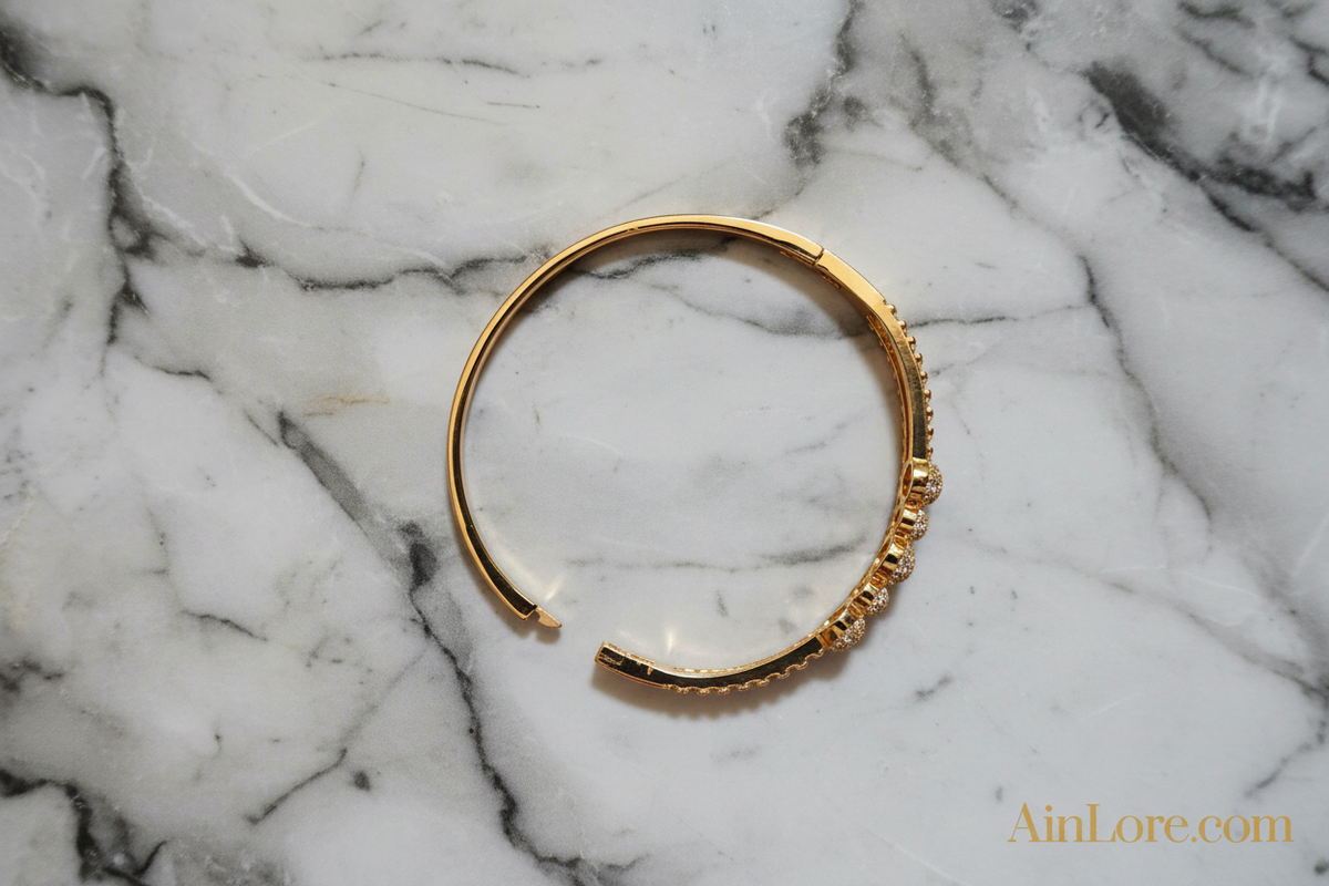 Pavé Globe Bangle on Black & White Marble