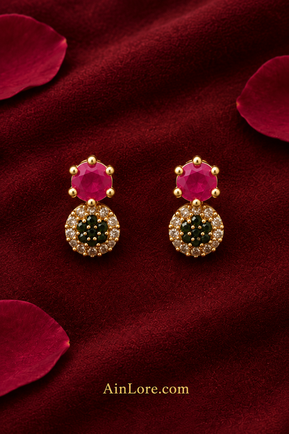 Pink-and-dark-stone earrings flatlay